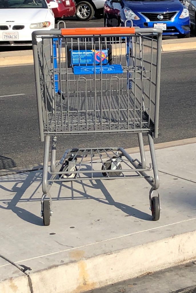 abandoned metal shopping cart
